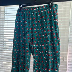 Women’s Green Pajama Pants with Santa Hat Print